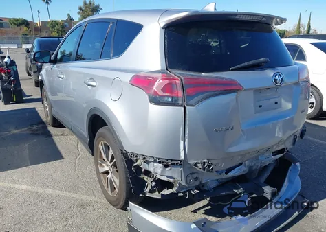 2018 Toyota Rav4 Xle from USA, damaged, VIN JTMWFREV1JD113094